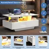 A modern white coffee table with built-in lighting and storage, shown in a living room setting. Produktbild-Vorschau