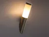 A wall-mounted light fixture with a frosted glass shade and a brushed metal base. Anteprima dell’immagine prodotto