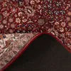The underside and edge of a rug are shown, with the patterned top surface partially rolled back. Produktbild-Vorschau