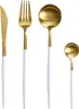A set of four gold and white cutlery items arranged vertically against a white background. Voir les images du produit