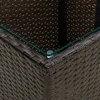 Close-up of the corner of a wicker table with a glass top. Produktbild-Vorschau