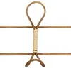 A close-up of a gold-colored metal coat rack with a beige woven handle. Náhled obrázku produktu