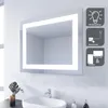 A bathroom scene with a mirror, sink, and faucet. Náhled obrázku produktu