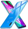 Two transparent phone cases are shown crossed over each other on a white background. The phone screens display colorful abstract graphics. Produktbild-Vorschau