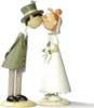 A wedding cake topper of a bride and groom kissing, made of metal. Produktbild-Vorschau