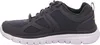 A side view of a gray athletic shoe with a white sole. Anteprima dell’immagine prodotto