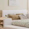 A close-up view of a bed with pillows and a blanket. Produktbild-Vorschau