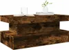 A dark wood-effect coffee table with a modern, block design. Voir les images du produit