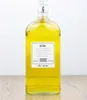 A bottle of Julischka Likör on a wooden surface against a white background. Produktbild-Vorschau