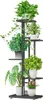 A multi-tiered metal plant stand filled with various potted green plants. Náhľad obrázku produktu