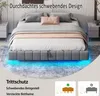 A modern bed frame with LED lighting in a bedroom setting. Náhľad obrázku produktu