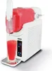 A slushie maker with a glass of slushie in front of it. Produktbild-Vorschau