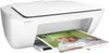 A white HP Deskjet 2130 printer is shown with a printed page emerging from the output tray. The printed page features an image of a baby wearing a frog-themed hat and text related to crafts and clothing. Produktbild-Vorschau