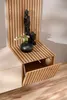 A modern TV stand with a slatted wood accent and an open cabinet. Anteprima dell’immagine prodotto
