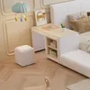 A child's bedroom with a bed, desk, and stool. Produktbild-Vorschau