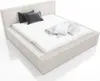 A modern bed with a textured headboard and frame, dressed with pillows and a blanket. Produktbild-Vorschau