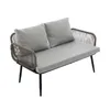 A grey outdoor sofa with two cushions and black legs, set against a white background. Podgląd zdjęcia produktu