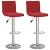 Two red velvet bar stools on a white background. Produktbild-Vorschau