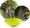 A set of dishes with a zebra and fern pattern, and a lime green bowl. Anteprima dell’immagine prodotto
