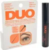 A product shot of DUO Brush-On Striplash Adhesive packaging and the product tube. Podgląd zdjęcia produktu