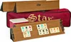 A Rummy/Okey game set with wooden racks and tiles, along with a red carrying bag and wooden storage boxes. Anteprima dell’immagine prodotto