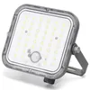 A close-up studio shot of a solar-powered outdoor floodlight with a motion sensor. Produktbild-Vorschau