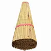 A rolled-up bamboo mat, tied with red bands, presented against a white background. Podgląd zdjęcia produktu