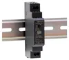 A black DIN rail power supply unit is mounted on a metal DIN rail. Produktbild-Vorschau