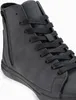 Close-up of a black high-top sneaker. Anteprima dell’immagine prodotto