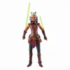 A Star Wars action figure of Ashoka Tano holding two lightsabers. Podgląd zdjęcia produktu