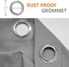 Close-up of a rust-proof grommet on a gray outdoor curtain, with dimensions indicated. Náhled obrázku produktu