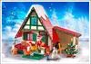 A Christmas-themed Playmobil playset featuring Santa's house, a snowman, and a Christmas tree. Produktbild-Vorschau