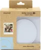 The image shows the retail packaging for a Fujifilm instax SQ 1 camera case in Glacier Blue. A sample photo of people is displayed on the front of the box. Produktbild-Vorschau