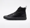 A black high-top Converse sneaker is shown against a white background. Produktbild-Vorschau