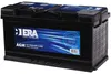 A black car battery with a blue and white label. Voir les images du produit