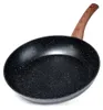 A black frying pan with a speckled surface and a wooden handle is shown against a white background. Produktbild-Vorschau