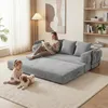 A woman reads a book on a modular sofa while a child and dog play on the floor in front of it. Anteprima dell’immagine prodotto