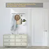 A hallway scene with a dresser, a coat rack, and a door. Produktbild-Vorschau