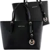 Two black tote bags are shown, one in front of the other, against a white background. Produktbild-Vorschau