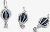 Three views of a silver hot air balloon charm with a blue stone. Produktbild-Vorschau