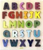 Puzzle encastré avec des lettres en bois colorées Voir les images du produit 5