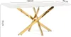 A rectangular dining table with a white marble-look glass top and a gold criss-cross metal base, shown against a white background with dimensions indicated. Anteprima dell’immagine prodotto