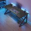 A gaming desk setup with a computer, keyboard, mouse, and headphones, illuminated by blue and purple LED lighting. Náhled obrázku produktu