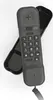 A black corded telephone handset resting on its black base. Podgląd zdjęcia produktu
