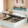 A bed with its storage compartment open, revealing stored items. The bed has LED lighting. Produktbild-Vorschau
