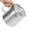 A hand holding a stainless steel pot with a lid. Podgląd zdjęcia produktu