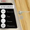 A door handle set is shown on a wooden door, with a black overlay detailing the included components. Produktbild-Vorschau