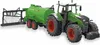 A green Fendt tractor with a tank trailer and a hose distributor attached, shown against a white background. Voir les images du produit
