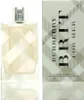 A perfume bottle and its packaging are displayed side-by-side against a white background. Podgląd zdjęcia produktu