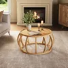 A living room scene with a fireplace, sofa, and a wooden coffee table. Anteprima dell’immagine prodotto